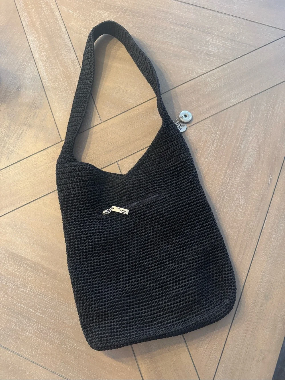 The Sak Black Crochet Shoulder Bag with Front Zipper
